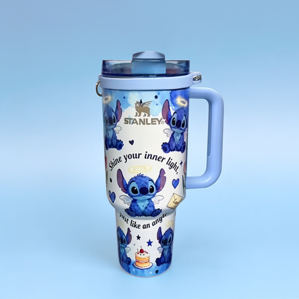 STANLEY Angel Blue tumbler featuring cute blue character artwork, angel-inspired details, insulated construction, and ergonomic handle.