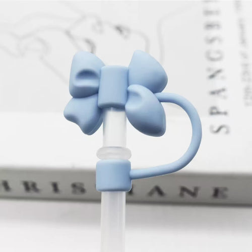 Blue bow-shaped straw cover on a white background
