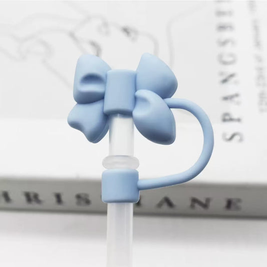 Blue bow-shaped straw cover on a white background