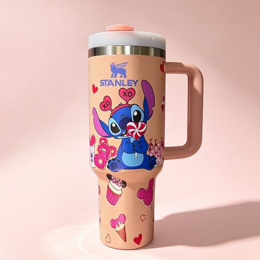 Pink Stanley 40oz insulated tumbler featuring a cute Stitch Valentine's design with hearts, sweets, ergonomic handle, and reusable lid.