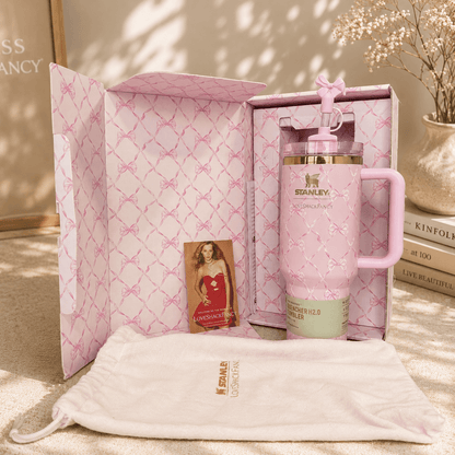 Pink Stanley mug with matching pouch and photo album in a decorative box.