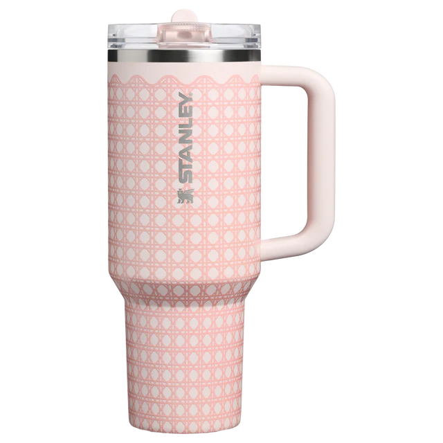 Pink polka dot Stanley mug on a white background