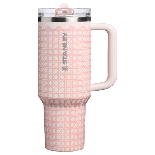 Pink polka dot Stanley mug on a white background