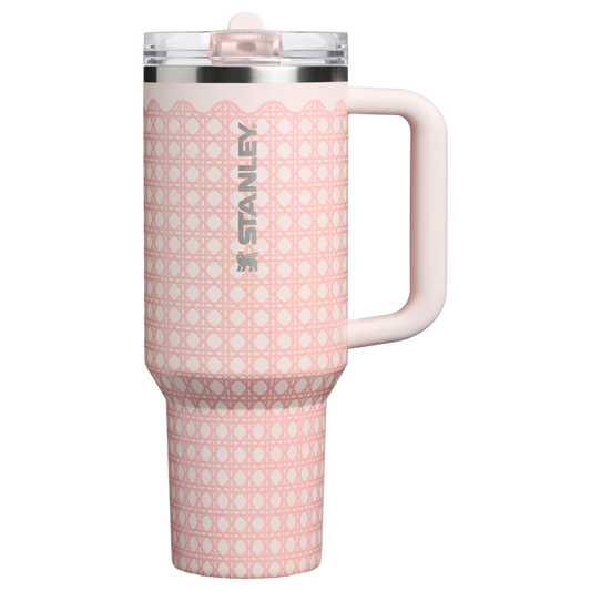 Pink polka dot Stanley mug on a white background