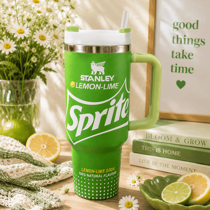 Stanley 40oz insulated tumbler featuring a Sprite-inspired lemon-lime green design with reusable straw, ergonomic handle, stainless steel construction, and double-wall vacuum insulation.