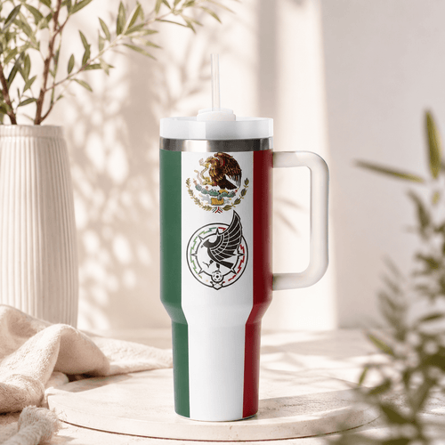 Stanley 40oz insulated tumbler with a Mexico soccer-inspired design featuring the Mexican flag colors, reusable straw, ergonomic handle, stainless steel construction, and double-wall vacuum insulation.
