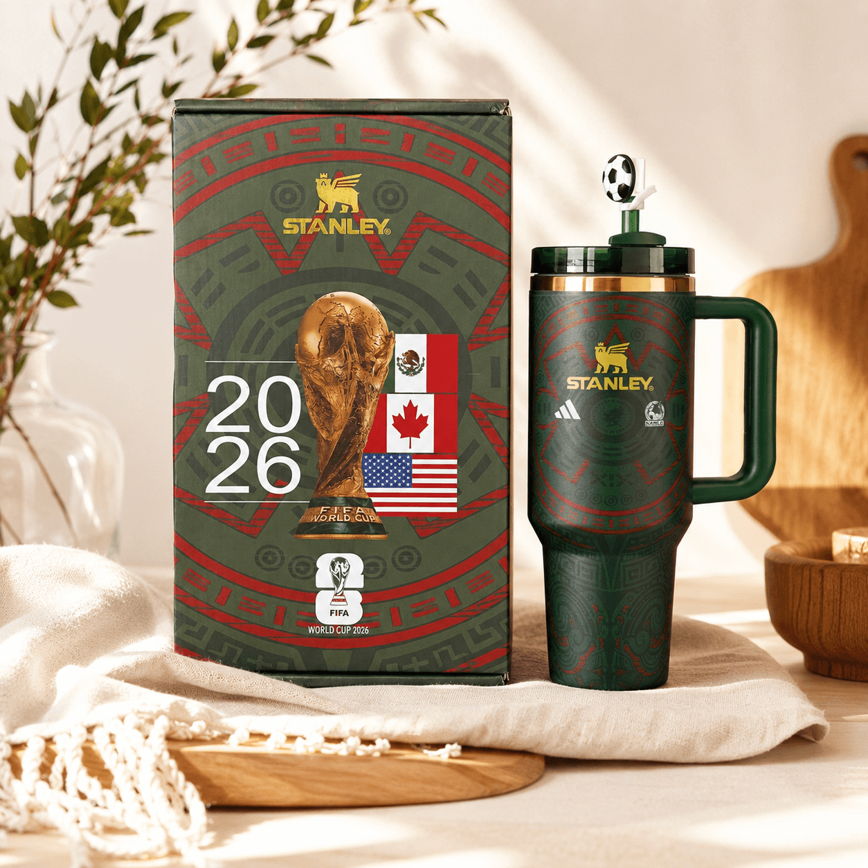 Stanley mug with packaging featuring FIFA World Cup 2026 branding on a neutral background.