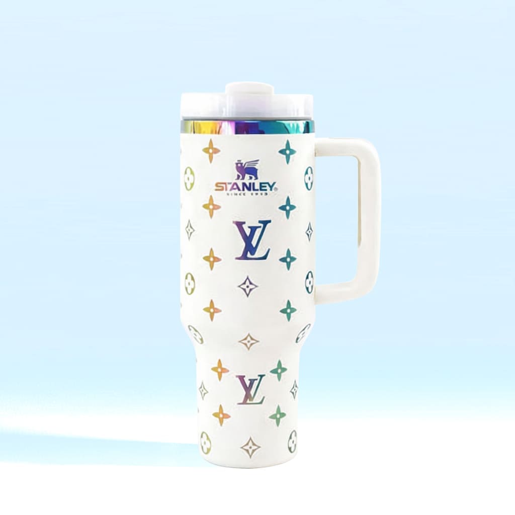 White tumbler with colorful logos on a light blue background